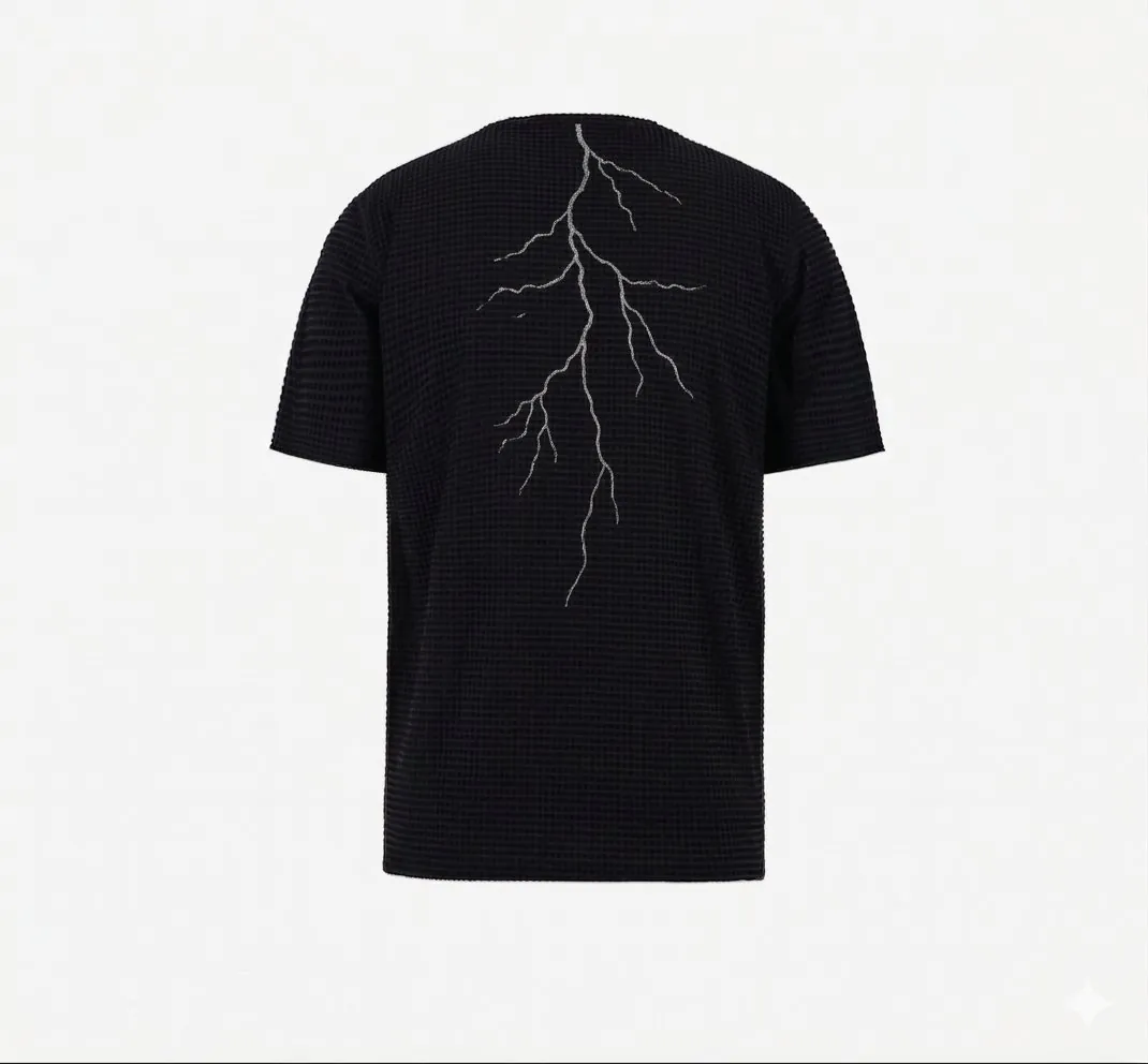 VYRE Bolt Tee, black shirt with reflective lightning print, shown in low light